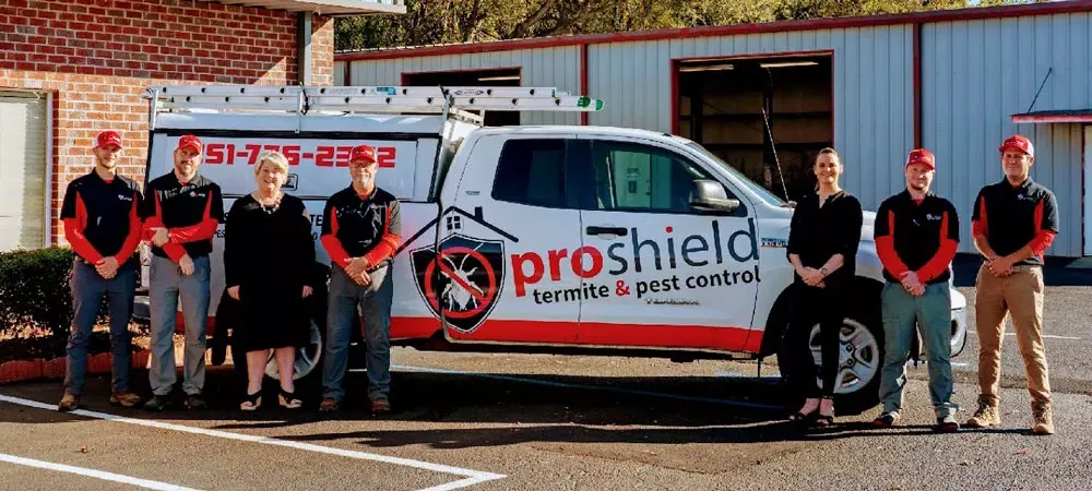 ProShield Termite and Pest team standing in front of truck